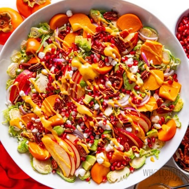 Persimmon salad in a bowl.
